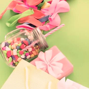 Festive composition set of gift boxes with balls candy cocktail materials. Stock Photos