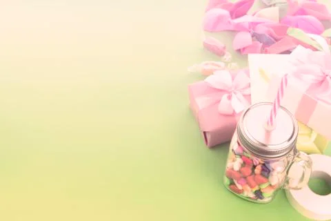 Festive composition set of gift boxes with balls candy cocktail materials. Stock Photos