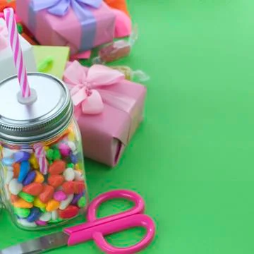 Festive composition set of gift boxes with balls candy cocktail materials. Stock Photos