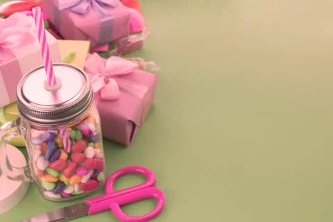 Festive composition set of gift boxes with balls candy cocktail materials. Stock Photos