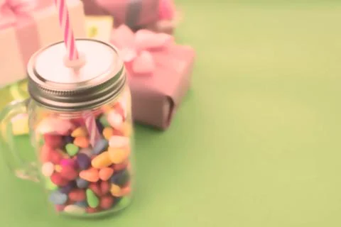Festive composition set of gift boxes with balls candy cocktail materials. Stock Photos