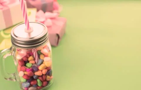 Festive composition set of gift boxes with balls candy cocktail materials. Stock Photos