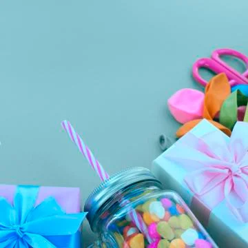 Festive composition set of gift boxes with balls candy cocktail materials. Stock Photos