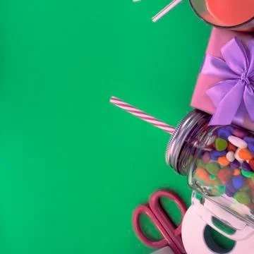 Festive composition set of gift boxes with balls candy cocktail materials. Stock Photos