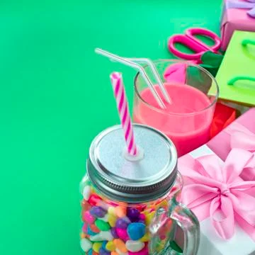 Festive composition set of gift boxes with balls candy cocktail materials. Stock Photos
