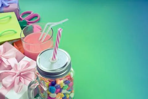 Festive composition set of gift boxes with balls candy cocktail materials. Stock Photos