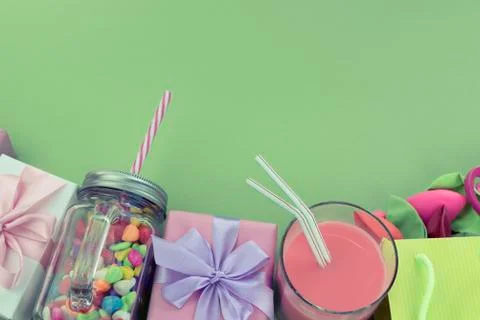 Festive composition set of gift boxes with balls candy cocktail materials. Stock Photos