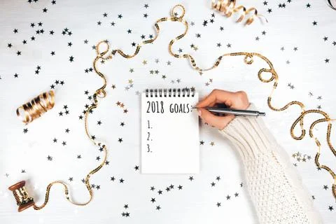 Festive decorations and notebook Stock Photos