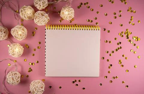 Festive decorations and notebook Stock Photos