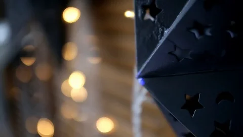 Festive decorations, blinking lights on a wooden wall Stock Footage 100854634