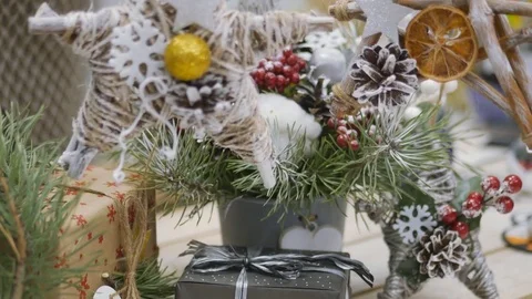 Festive decorations. The work of a designer-decorator. On the eve of Christmas. Stock Footage 83282916