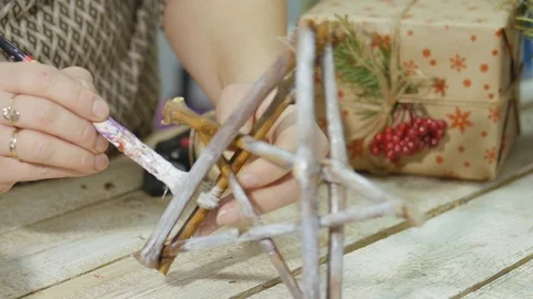 Festive decorations. The work of a designer-decorator. On the eve of Christmas. Stock Footage 83318683