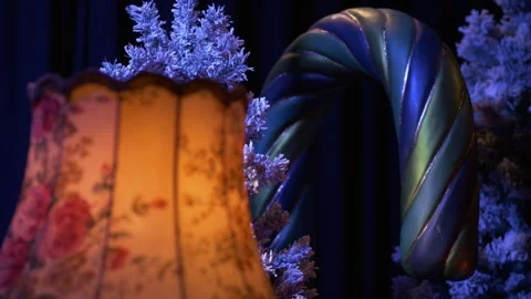 Festive Delights: Captivating Focus Pull from Lamp to Christmas Candy Cane Stock-Footage 241043612