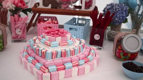 Festive dessert table for a buffet table, a lot of colorful sweets for children. Stock Footage 242347167
