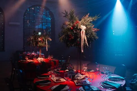 Festive dining table with elegant decorations and ambient lighting  Stock Photos