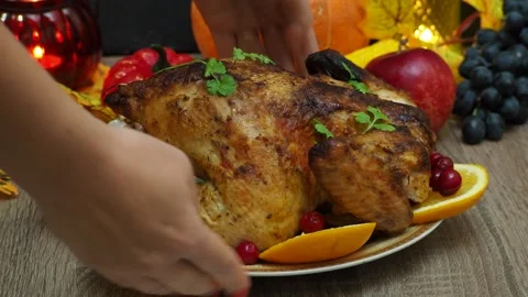 Festive dinner at home. chicken with oranges. Thanksgiving or Christmas dinner 스톡 동영상 257595347