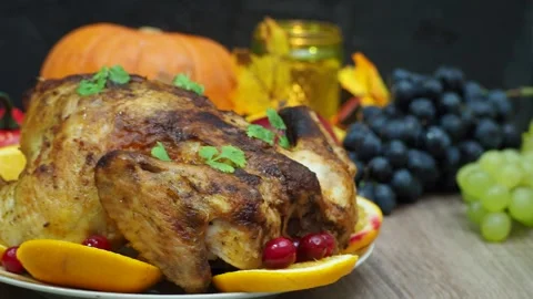 Festive dinner at home. chicken with oranges. Thanksgiving or Christmas dinner 스톡 동영상 257597190