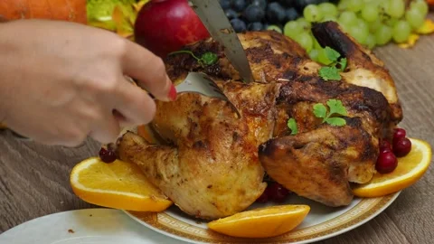 Festive dinner at home. chicken with oranges. Thanksgiving or Christmas dinner Stock Footage 257599580