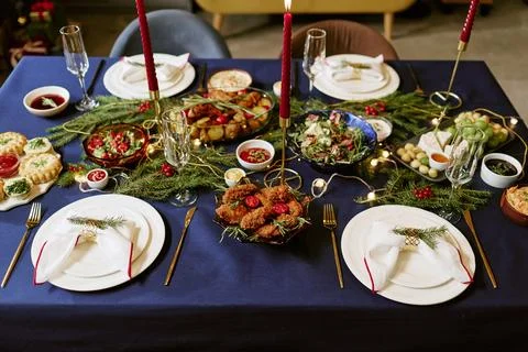 Festive Dinner Table Setting Serving Holiday Food for Christmas Celebration Stock Photos