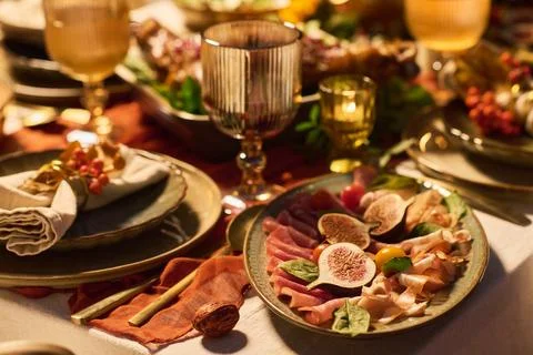 Festive Dinner Table Setting Serving Prosciutto with Figs for Holiday Stock Photos
