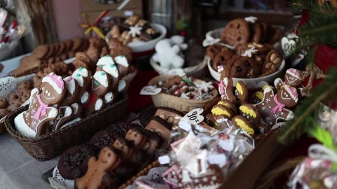A festive display of intricately decorated gingerbread cookies in various shapes Stock Footage 293374601