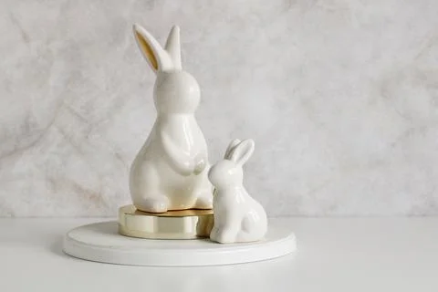 Festive Easter background. Easter bunny figurines close-up on the table. co.. Stock Photos