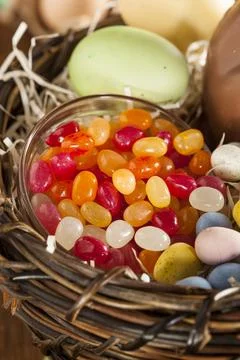 Festive Easter Candy in a Basket for the Holidays Stock Photos