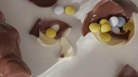 Festive Easter Chocolate Eggs and Colorful Candies Celebrating Holiday Joy Stock Footage 332944193