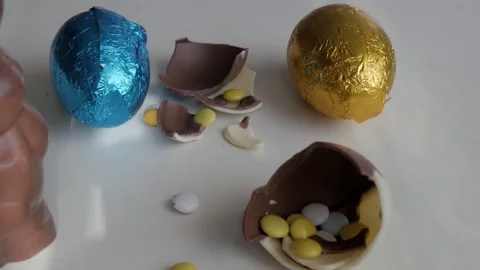 Festive Easter Chocolate Eggs and Candies on a Table Stock Footage 332944232