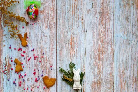 Festive Easter composition on a light blue wooden background, with decorative Stock Photos