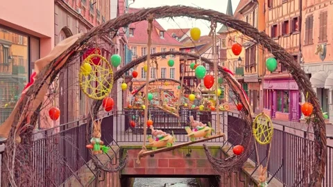 Festive Easter decorations on historic canal bridge in Colmar zoom, 4K Stock Footage 340846948