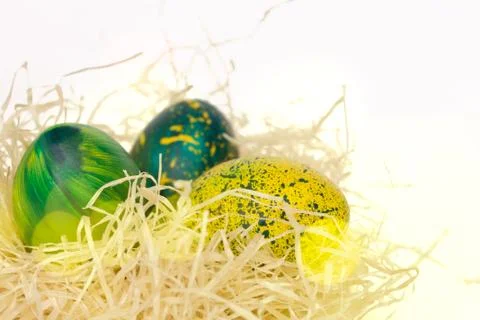 Festive Easter Eggs in Hay Stock Photos