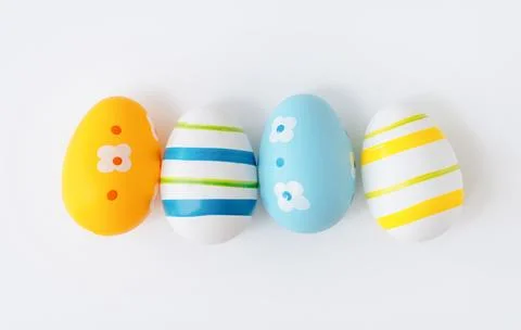 A festive Easter flat lay with colorful eggs Stock Photos