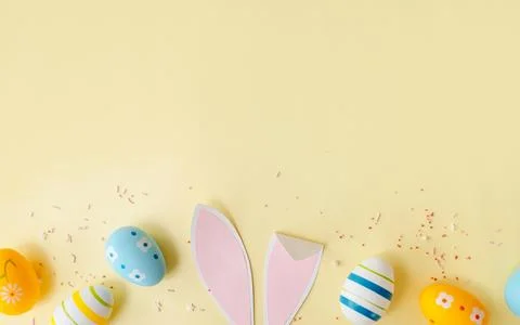 A festive Easter flat lay with colorful eggs Stock Photos