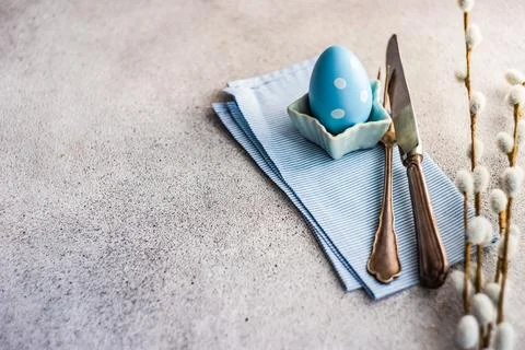 Festive Easter place setting decorated with eggs 写真素材