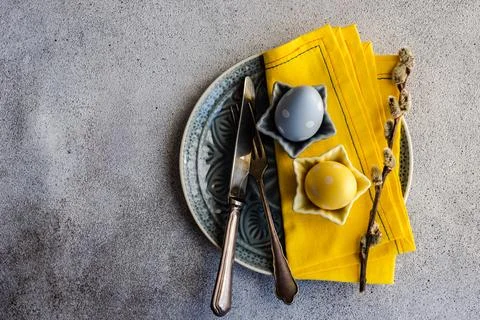 Festive Easter place setting decorated with eggs Stock Photos