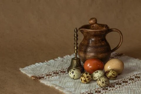 Festive Easter still life with eggs and earthenware jug. Blank for postcards. Fotos de archivo