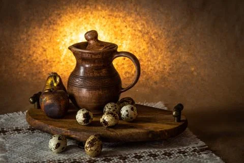 Festive Easter still life with eggs and earthenware jug. Blank for cards. Foto stock