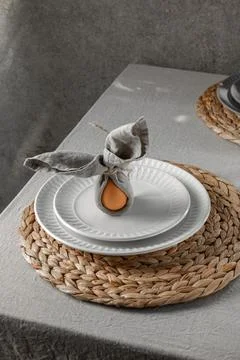 Festive Easter table setting. Funny Easter bunny made of egg and linen napkin Stock Photos