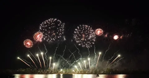 Festive fireworks on the background of the night sky. Magnitogorsk, Russia Stock Footage 220515507