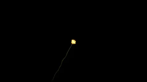 Festive fireworks explode on black background. Computer graphics, bright Stock Footage 78730637