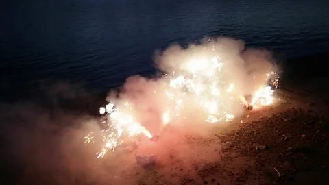Festive Fireworks on the shore Stock Footage 81319803