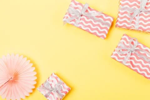 Festive flat lay composition of pink gift boxes 库存照片