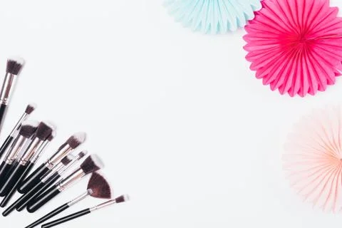 Festive flat lay set of makeup brushes 库存照片
