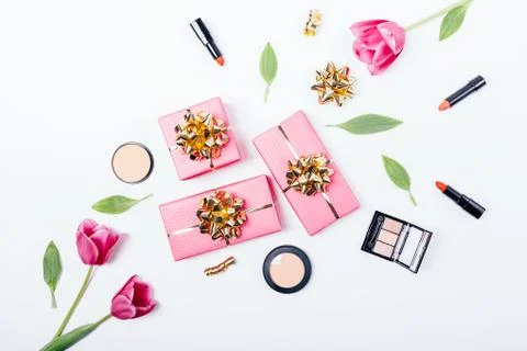 Festive flat layout of pink gift boxes Stock Photos