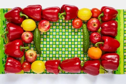Festive frame from vegetables and fruit on a green towel Stock Photos