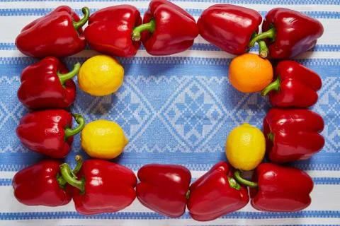 Festive frame from vegetables and fruit on a blue towel Stock Photos
