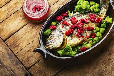 Festive fried fish. Stock Photos