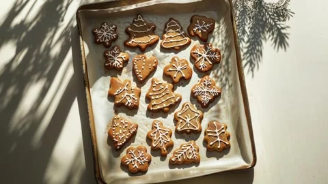 Festive Gingerbread Cookies with Icing on a Baking Tray for Christmas Stock Footage 294508333