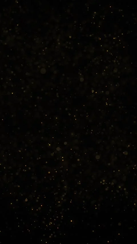 Festive gold colored particles flying up on black vertical background Stock-Footage 346393427